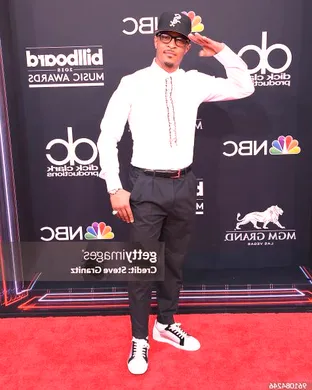 T.I.
